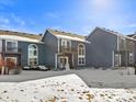 Exterior view of back of the townhomes with walkout balconies at 281 Rockview Dr, Superior, CO 80027