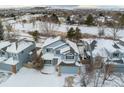 Two-story house in a snow-covered neighborhood at 1524 E Weldona Way, Superior, CO 80027