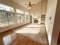 Bright living room featuring a fireplace and ample natural light at 1524 E Weldona Way, Superior, CO 80027