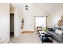 Entryway with view into living room and access to stairs at 5604 S Yakima Way, Aurora, CO 80015