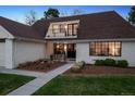 Charming single-story home boasts a lush front lawn and a second story balcony at 4970 S Chester St, Greenwood Village, CO 80111