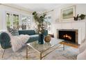 Comfortable living room with fireplace and lots of natural light at 1944 Hudson St, Denver, CO 80220
