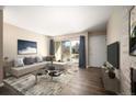 Inviting living room boasts modern decor, fireplace, and balcony access at 50 S Boulder Cir # 5022, Boulder, CO 80303