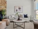 Bright living room with stone fireplace, modern decor, and ample natural light at 19726 Applewood Ct, Parker, CO 80138