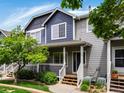 Attractive townhouse with well-kept lawn, tasteful siding and covered front porch at 19246 E Carolina Pl # 102, Aurora, CO 80017