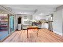 Bright and airy living space with stainless steel appliances and access to the patio at 655 N Pearl St # 108, Denver, CO 80203