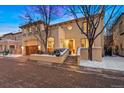 Charming two-story home featuring an attached garage and well-manicured landscaping at 100 S University Blvd # 11, Denver, CO 80209