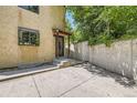 Cozy courtyard featuring concrete patio and privacy wall perfect for outdoor relaxation at 800 Illinois St # 1, Golden, CO 80401