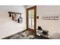 Welcoming entryway features slate floors, coat rack, and convenient shoe storage at 800 Illinois St # 1, Golden, CO 80401