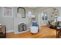 Living room with fireplace and hardwood floors at 1445 Elm St, Denver, CO 80220