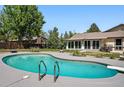 Backyard inground pool perfect for enjoying those hot summer days at 5197 S Perry St, Littleton, CO 80123