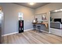 Cozy dining area featuring a built-in counter, bar stools, and modern flooring at 4595 S Lincoln St, Englewood, CO 80113