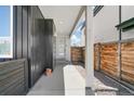 Inviting covered front porch of a modern home with stylish accents and an address marker at 3632 Lipan St, Denver, CO 80211