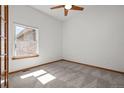 Bright bedroom featuring plush carpeting, a window, and neutral paint, ready for personalization at 14447 Inca Ct, Westminster, CO 80023