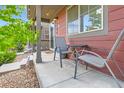 Inviting front porch with outdoor seating, creating a relaxing space at 1199 Hummingbird Cir, Longmont, CO 80501