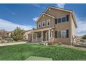 Charming two-story home with neutral siding, covered porch, and well-manicured lawn at 4206 Eagle Ridge Way, Castle Rock, CO 80104
