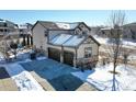 Two-story house with attached two-car garage, viewed from above at 16686 Rinker Way, Broomfield, CO 80023