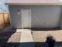 Private backyard space with a convenient back door, offering a peaceful retreat and easy access at 15690 E Mexico Ave, Aurora, CO 80017