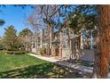 Charming townhomes feature lush front lawn, private patios, and beautiful architectural details at 1673 S Fulton St, Aurora, CO 80247