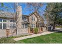 Charming townhomes feature lush front lawn, private patios, and beautiful architectural details at 1673 S Fulton St, Aurora, CO 80247