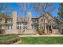 Charming townhomes feature lush front lawn, private patios, and beautiful architectural details at 1673 S Fulton St, Aurora, CO 80247