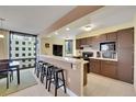 Modern kitchen with dark wood cabinets and stainless steel appliances at 1625 Larimer St # 807, Denver, CO 80202