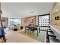 Spacious living room with city views and large windows at 1625 Larimer St # 807, Denver, CO 80202