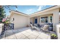 Charming outdoor patio with comfortable seating, ideal for relaxing or entertaining guests outdoors at 9559 Brook Hill Ln, Lone Tree, CO 80124