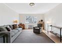 Cozy living room with neutral tones, offering a relaxing and inviting atmosphere at 1321 E 10Th Ave # 11, Denver, CO 80218