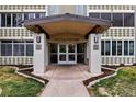 Close up of apartment entrance at 750 S. Alton Way with modernist architectural elements at 750 S Alton Way # 9B, Denver, CO 80247