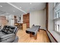 Spacious living area featuring exposed wood, rustic elements, and an open layout at 720 16Th St # 421, Denver, CO 80202