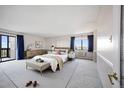 Cozy bedroom featuring natural light, neutral colors, and stylish furnishings for a relaxing retreat at 14390 E Marina Dr # 606, Aurora, CO 80014
