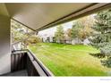 Scenic view from the balcony overlooking lush greenery and well-maintained landscaping at 7110 S Gaylord St # L7, Centennial, CO 80122