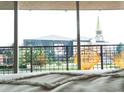 Scenic view from the balcony of the University of Denver, highlighted by sunny, yellow outdoor seating at 2225 Buchtel Blvd # 202, Denver, CO 80210