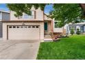 Charming two-story home featuring a well-manicured lawn and attached two-car garage, offering curb appeal at 7796 Xavier Ct, Westminster, CO 80030
