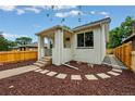 Beautiful exterior with white brick, landscaping, nice porch, and walkway leading to the front door at 3346 W 33Rd Ave, Denver, CO 80211