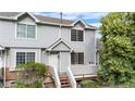 Well-maintained townhome featuring a classic exterior with inviting entryway and large windows at 4070 E 119Th Pl # B, Thornton, CO 80233