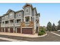 Well-maintained condo unit with attached garage offering convenient parking and additional storage at 9363 Amison Cir # 106, Parker, CO 80134