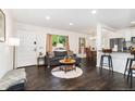 Spacious open floor plan that combines a living room, dining area, and kitchen, ideal for modern living at 739 S Utica St, Denver, CO 80219