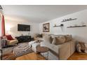 Cozy living room with a comfortable sofa, stylish decor, and an inviting atmosphere at 2520 Dover Ct, Lakewood, CO 80215
