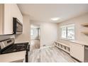 Modern kitchen showcases stainless steel appliances and bright, well-lit design at 970 Lima St, Aurora, CO 80010