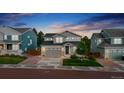 Lovely two-story home with a neutral color scheme, complemented by a well-manicured lawn at 640 Avena Dr, Elizabeth, CO 80107