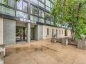 Contemporary building entrance with tiled accents and clean, modern lines creates a welcoming atmosphere at 1050 N Corona St # 105, Denver, CO 80218