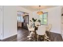 Cozy dining area with a modern light fixture, perfect for intimate meals at 1901 S Adams St, Denver, CO 80210