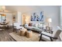 Bright living room boasts stylish furniture and decor, perfect for relaxing and entertaining at 1901 S Adams St, Denver, CO 80210