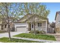 Inviting single-Gathering home with a well-maintained lawn and a charming front porch at 9751 Mobile St, Commerce City, CO 80022