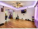 Spacious living room with hardwood floors and ceiling fan at 1333 Hanover St, Aurora, CO 80010
