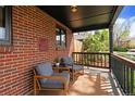 Relaxing front porch with comfortable seating and a cozy atmosphere at 2120 N Poplar St, Denver, CO 80207