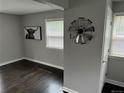 Inviting living room showcasing dark hardwood floors, neutral paint, and modern decor at 1125 Nome St, Aurora, CO 80010