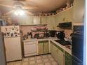 The outdated kitchen is ready for an upgrade at 8611 Emerson Ct, Denver, CO 80229
